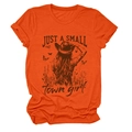 Detail of vintage Just a Small Town Girl graphic print on vibrant orange cotton t-shirt - Orange