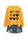 Detail of yellow sweatshirt with nine black heart prints and distressed denim shorts - Yellow (Black Print)