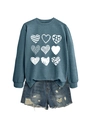 Detail of teal crewneck sweatshirt with nine white heart prints and ripped denim shorts - Blue (White Print)