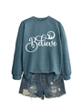 Detail of blue Believe sweatshirt with Christmas nativity silhouette and ripped denim shorts - S / Blue with White Graphic