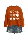 Detail of a crewneck sweatshirt with nine heart patterns and love text in white print - Burnt Orange (White Print)
