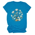 Detail of blue t-shirt featuring artistic floral wreath print and cuffed short sleeves - Lake Blue