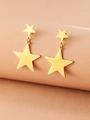 Macro view of gold-plated star tassel earrings with high-polish mirror finish detail - Gold