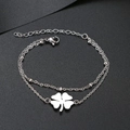 Bracelet double rang en acier inoxydable avec trèfle et perles sur fond noir élégant - Argent (N3500)