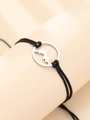 Macro detail of mountain pendant on adjustable black cord bracelet against neutral prop - Silver Mountain Pendant Style (N2656)