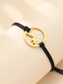 Macro shot of mountain peak pendant on minimalist black braided rope bracelet - Gold Mountain Pendant Style (N2655)