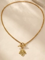 Macro detail of gold maple leaf pendant with chunky chain and classic OT toggle clasp - Gold Maple Leaf Style (C209)