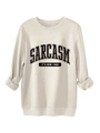 Detailed view of cream sweatshirt fabric with black Sarcasm It's How I Hug slogan print - S / Sand