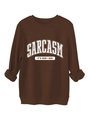 Detail of the white SARCASM slogan print on a comfortable brown crewneck sweatshirt - Coffee
