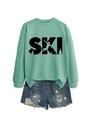 Detail of mint green SKI sweatshirt with graphic print and denim shorts on white background - S / Light Green (Black Print)