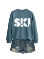 Detail of navy SKI graphic sweatshirt paired with distressed denim shorts - S / Blue (White Print)