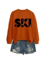 Detail of orange crewneck SKI sweatshirt paired with distressed denim shorts on white - S / Burnt Orange (Black Print)