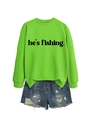 Flat lay of neon green crewneck sweatshirt and distressed blue denim shorts set - Neon Green (Black Text)