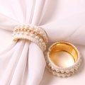 Elegant pearl bead napkin ring with gold chain detail on a white silk cloth - Pearl Chain Braided Style