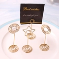 Golden stainless steel star and round spiral card holders in a decorative dish - Star and Spiral Mixed Set (JS-004) / Gold