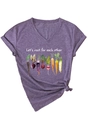 Detail of purple V-neck t-shirt with Let's root for each other slogan and vegetable print - Purple (White Graphic)