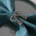 Antique silver metal napkin ring with twisted bow design and tassel details for table decor - Antique Silver