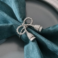 Silver bow knot metal napkin ring with tassels for festive table decorations - Silver