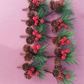 Christmas napkin ring with natural pine cones, red berries and green pine needles - Christmas Decorations: Pine Cones And Pine Needles