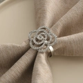 Elegant hollow rose napkin ring with silver metal finish and sparkling rhinestones - Silver