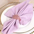 Rose gold multi-layered wire napkin ring with bead accents on light purple linen - Rose Gold
