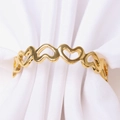 Elegant gold hollow heart napkin rings for romantic Valentine's Day dinner table setting - Gold