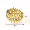 Golden leaf design napkin ring with detailed metallic texture, dimensions 5cm x 3cm - Gold Leaves