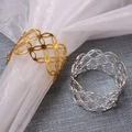 Detail of geometric hollow napkin rings in gold and silver finish with polished metal texture - Gold & Silver 2-Piece Set (ZWZ-INR-195 Style A)