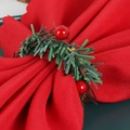 Christmas napkin ring with red berries and green pine needles on red fabric napkin - Christmas Red Berry Woven Wreath Napkin Ring