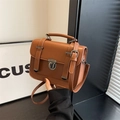 Vintage brown leather crossbody bag with metal buckle closure and top handle - 20*7*16cm / Brown