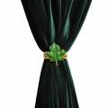 Detail of green maple leaf curtain tieback with gold edges on velvet fabric - Green Maple Leaf Curtain Tieback