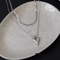 Silver-colored double-layer stainless steel necklace featuring a snake chain and heart pendant - Silver Style (F3408)