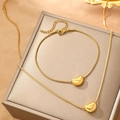 Elegante set di collana e bracciale a maglia serpente dorata con pendenti a chicco - Stile Dorato (F1783)