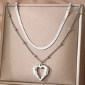 Double-layered stainless steel necklace with hollow heart pendant and snake bone chain - Silver (C6232)