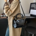 Retro black oiled leather Boston bag with contrast white stitching and gold hardware - Black