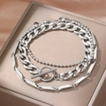 Ensemble de trois bracelets en acier inoxydable avec chaîne gourmette et fermoir à bascule - Ensemble de 3 Bracelets Argentés (N3264)