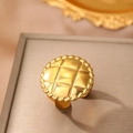 Vintage gold quilted texture ring with rope edge detail on a brown jewelry display - Gold Quilted Style (C9665)