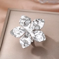 Polished silver five-petal flower ring with hammered texture on elegant jewelry box - Silver (C9738)