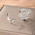 Minimalist irregular wavy silver ring set with high polish finish on leather display - Silver Irregular Wave Line Style (C9314)