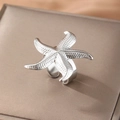 Elegant silver starfish open ring with textured details on a brown jewelry display box - Silver (C8932)