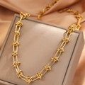 Gold knotted link necklace in chunky industrial style over premium satin fabric - Gold (C2269)