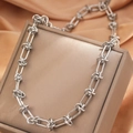 Polished silver stainless steel knotted chain necklace on luxury silk jewelry display - Silver (C2270)