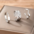 Three-piece stainless steel ring set with irregular lava textures and smooth wide bands - Silver (F826)