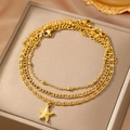 Drielagige gouden enkelbandjesset met zeester hanger en diverse schakelkettingen - Gouden Stijl (C6271)