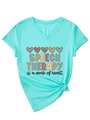 Detail view of V-neck t-shirt knot hem and heart graphic with speech therapy slogan - S / Deep Water Blue