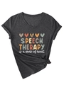 Detail view of charcoal V-neck tee with heart prints and Speech Therapy lettering - S / Black Heather Grey