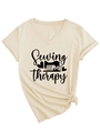Detail of V-neck T-shirt showing Sewing is my therapy print and stylish side knot design - S / Sand (Black Font)