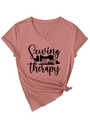 Detail of V-neck T-shirt in dusty pink featuring a sewing machine slogan print - Rose Gold (Black Font)