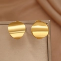 Polished gold irregular curved stud earrings displayed on a beige jewelry stand - Gold Irregular Hammered Style (F501)