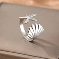Adjustable silver shell and starfish open ring featuring a polished marine style design - Silver Starfish Shell Style (C5364)